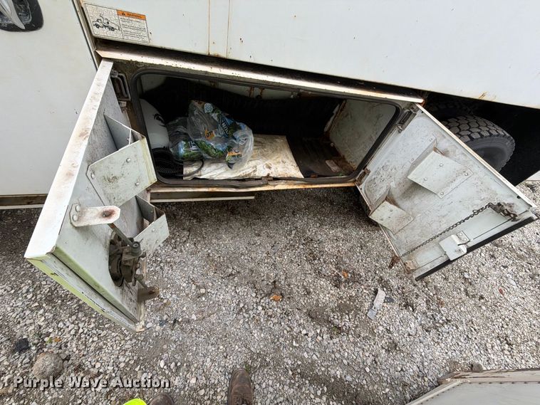 image for item YA3904 2010 Ford F750 Super Duty chipper truck
