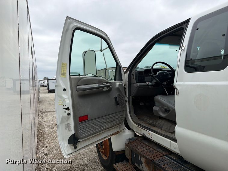 image for item YA3904 2010 Ford F750 Super Duty chipper truck