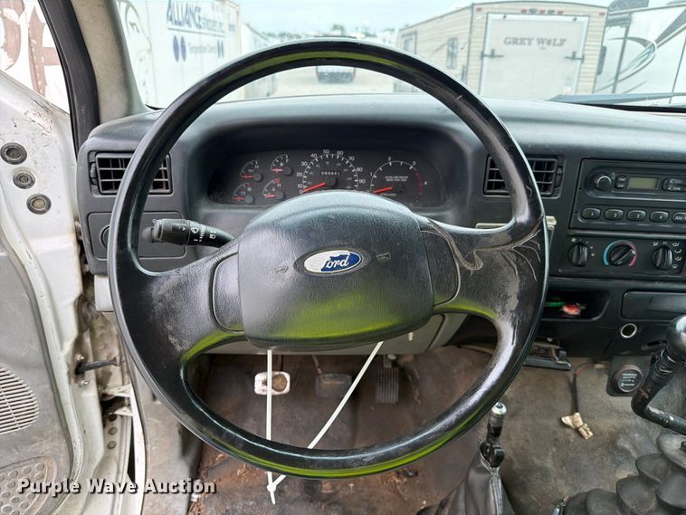 image for item YA3904 2010 Ford F750 Super Duty chipper truck