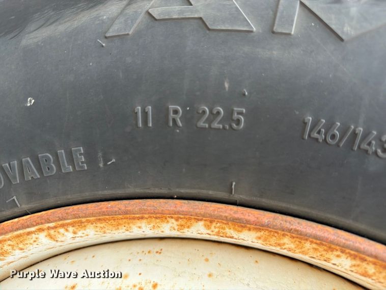 image for item YA3904 2010 Ford F750 Super Duty chipper truck
