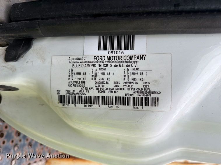image for item YA3904 2010 Ford F750 Super Duty chipper truck