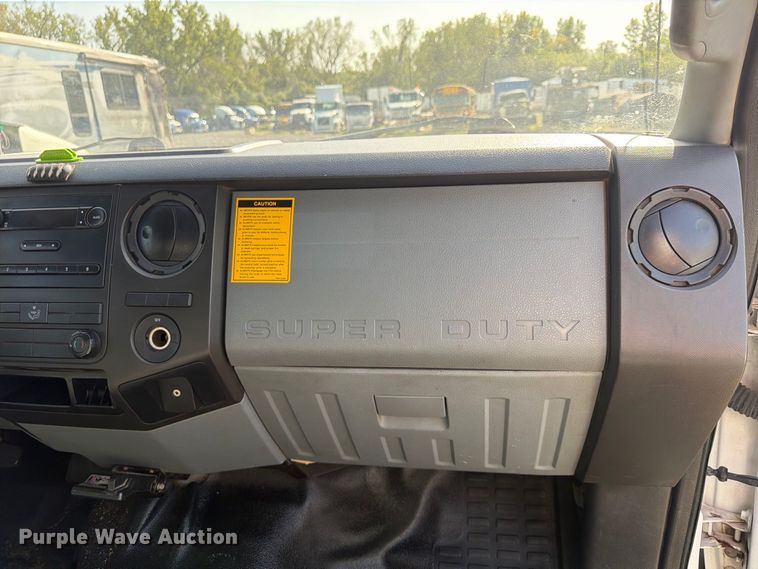 image for item YA4860 2016 Ford F650 Super Duty chipper truck