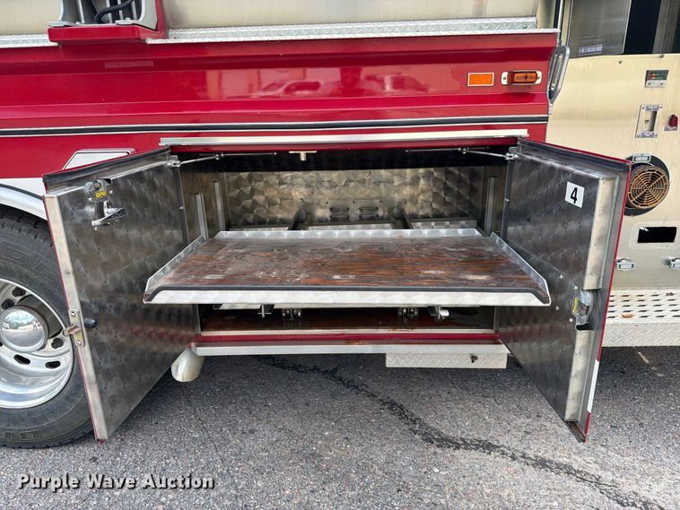 image for item ET8679 2000 Freightliner FL112 pumper fire truck