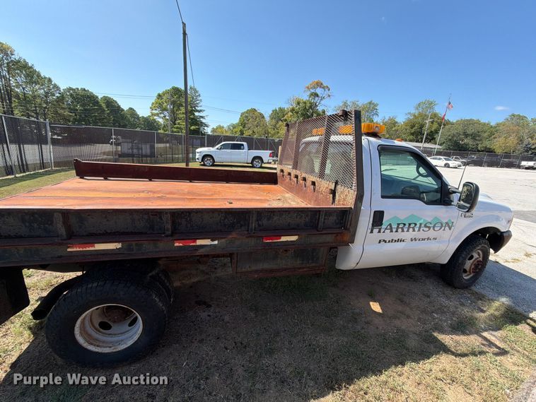 image for item EX0061 1999 Ford F350 flatbed pickup truck