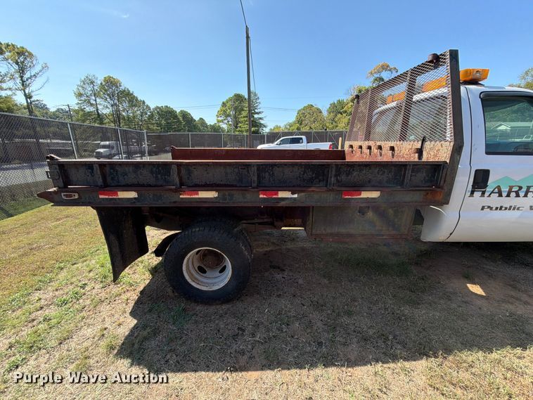 image for item EX0061 1999 Ford F350 flatbed pickup truck