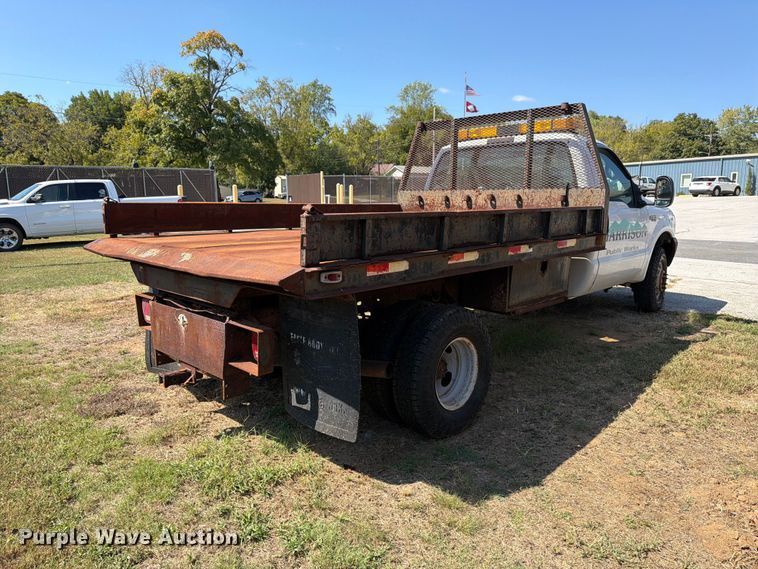 image for item EX0061 1999 Ford F350 flatbed pickup truck