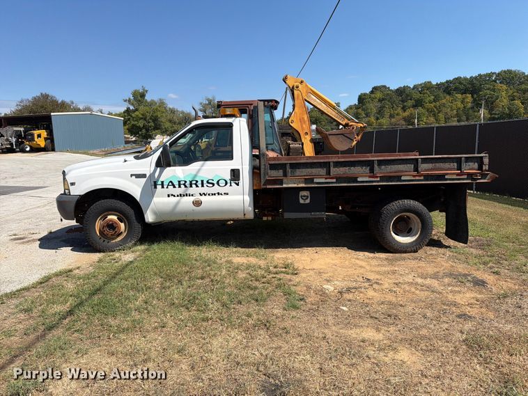 image for item EX0061 1999 Ford F350 flatbed pickup truck