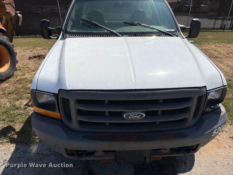 image for item EX0061 1999 Ford F350 flatbed pickup truck