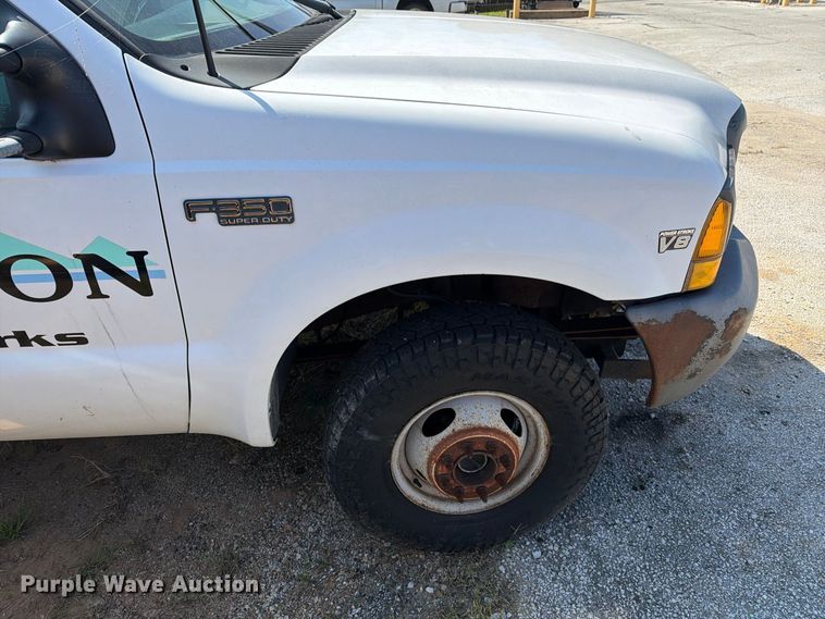 image for item EX0061 1999 Ford F350 flatbed pickup truck
