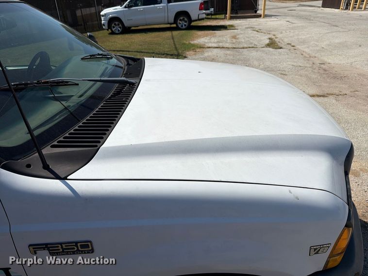image for item EX0061 1999 Ford F350 flatbed pickup truck