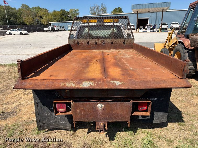 image for item EX0061 1999 Ford F350 flatbed pickup truck