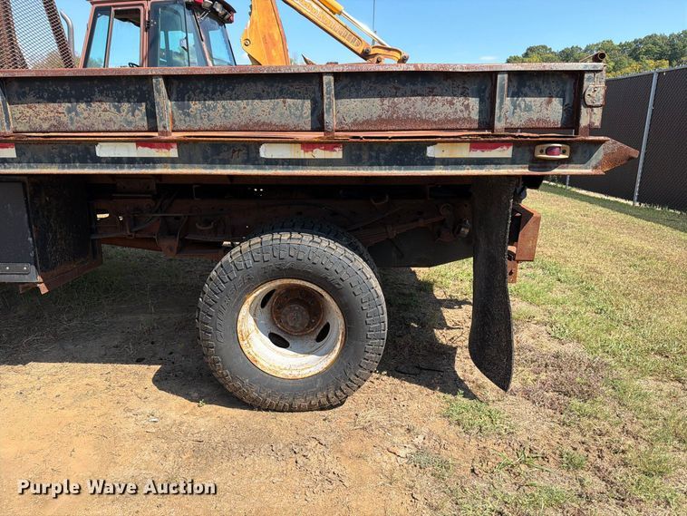 image for item EX0061 1999 Ford F350 flatbed pickup truck