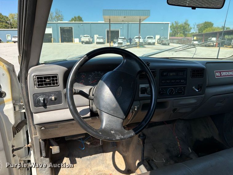 image for item EX0061 1999 Ford F350 flatbed pickup truck