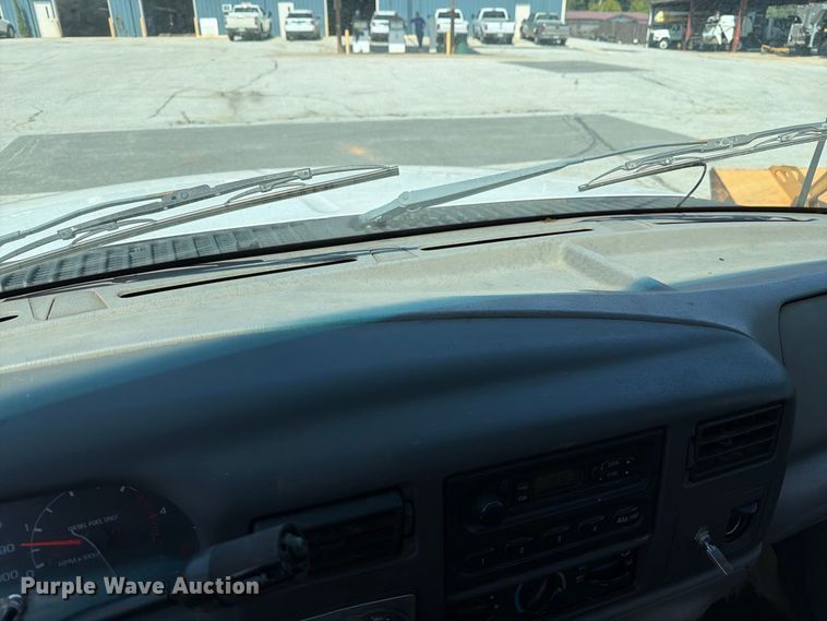image for item EX0061 1999 Ford F350 flatbed pickup truck