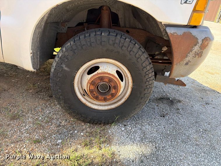 image for item EX0061 1999 Ford F350 flatbed pickup truck