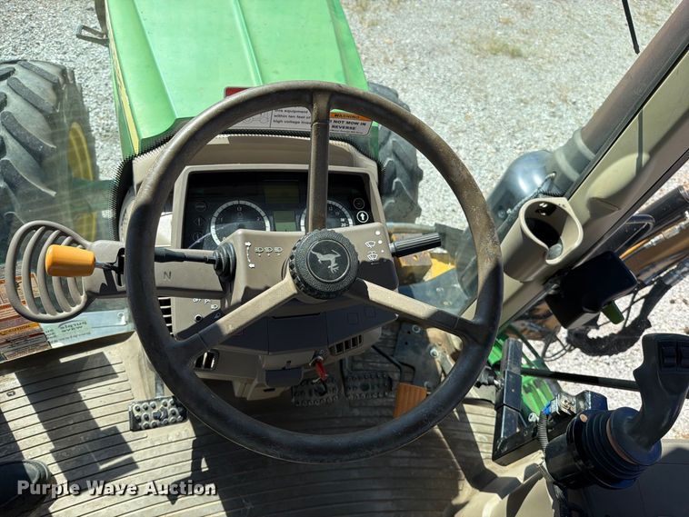image for item FN5865 2016 John Deere 6120M MFWD tractor