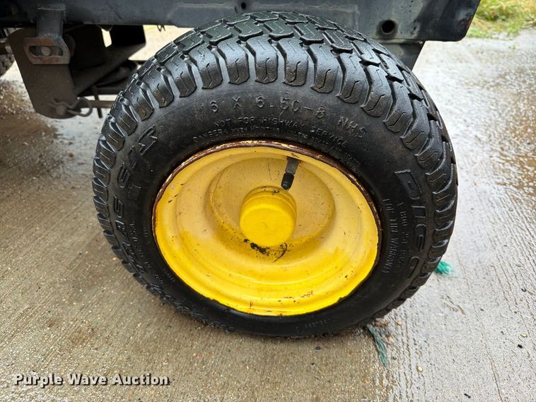 image for item FT6747 John Deere 322 lawn mower