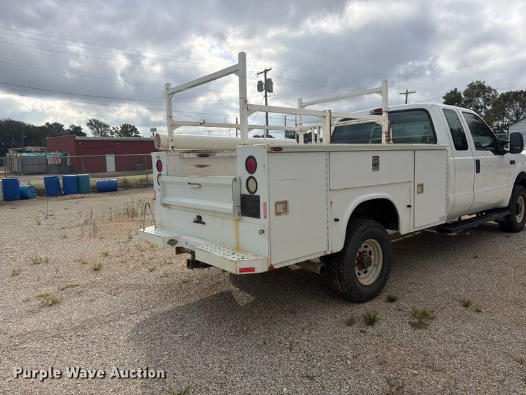 image for item FU4709 2002 Ford F350 Ext. Cab utility bed pickup truck