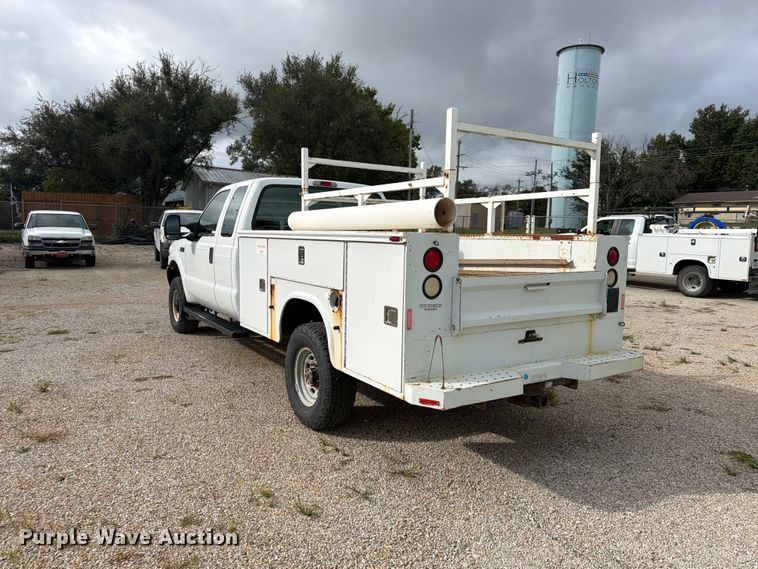 image for item FU4709 2002 Ford F350 Ext. Cab utility bed pickup truck