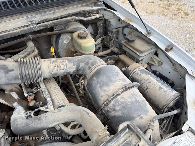 image for item FU4709 2002 Ford F350 Ext. Cab utility bed pickup truck