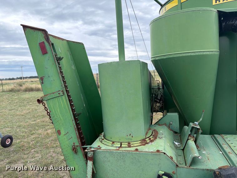 image for item EI7729 John Deere 700 bale processor