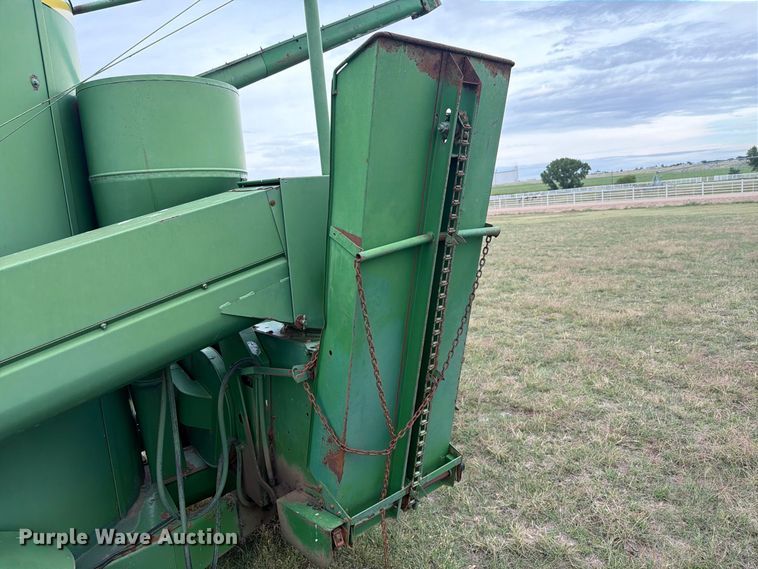 image for item EI7729 John Deere 700 bale processor