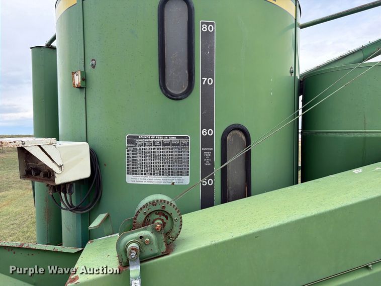 image for item EI7729 John Deere 700 bale processor