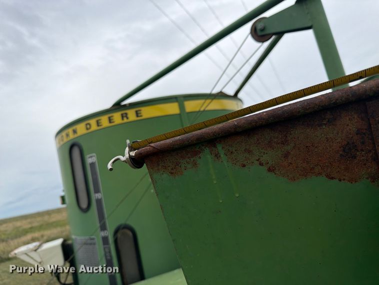 image for item EI7729 John Deere 700 bale processor