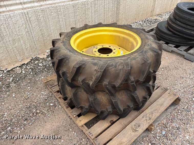 image for item EW4386 (2) 11.2-24 tires and wheels