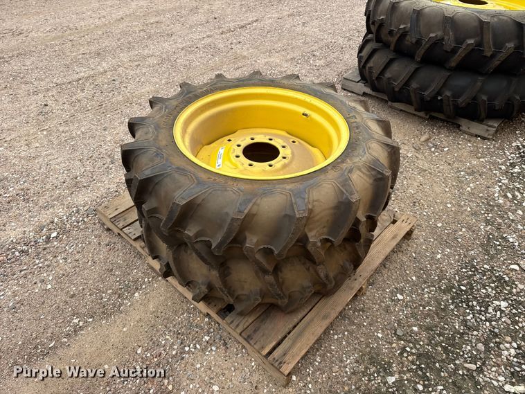 image for item EW4386 (2) 11.2-24 tires and wheels