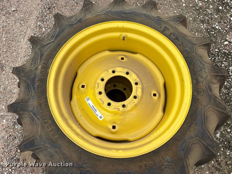 image for item EW4386 (2) 11.2-24 tires and wheels