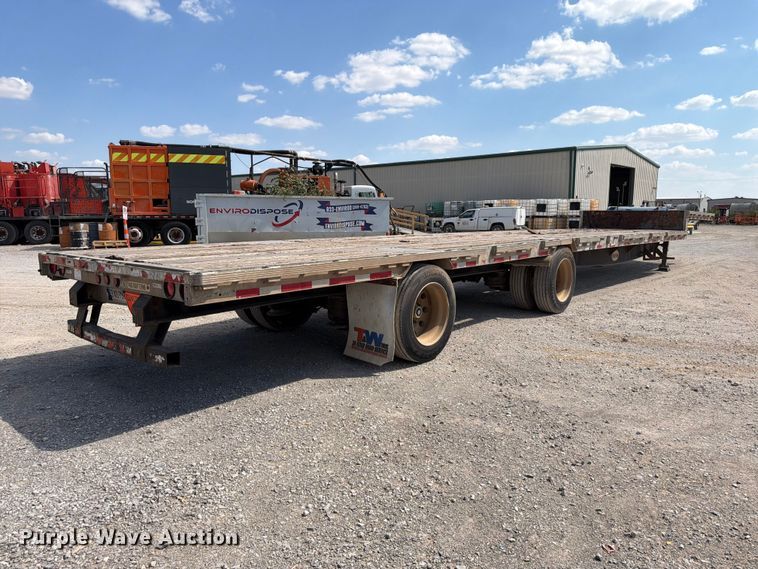 image for item EW8929 1999 Reinke drop deck trailer