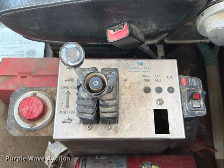 image for item FT6124 2017 Peterbilt 348 roll-off container truck