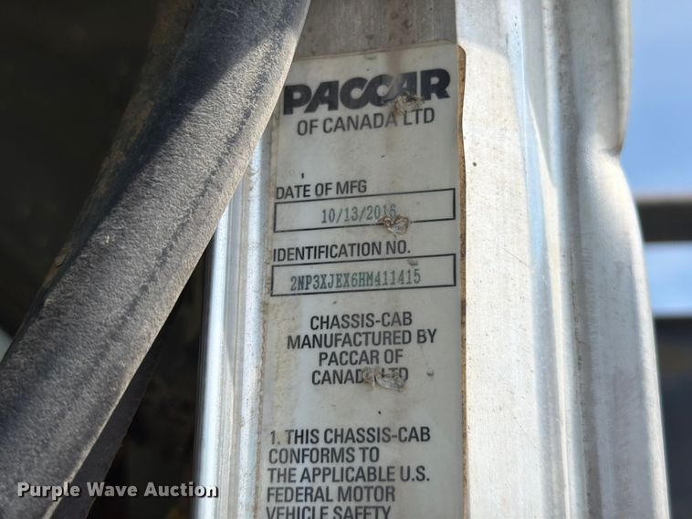 image for item FT6124 2017 Peterbilt 348 roll-off container truck