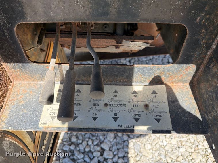 image for item YA5128 2018 Freightliner Business Class M2 rollback truck