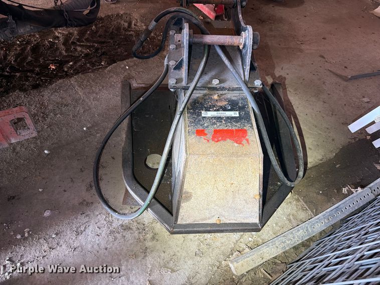 image for item EX4624 RUT Manufacturing tree shredder backhoe attachment