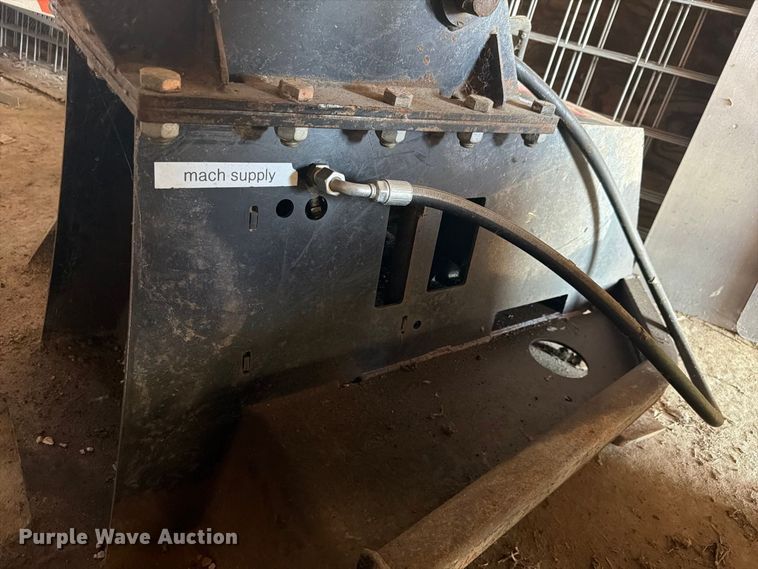 image for item EX4624 RUT Manufacturing tree shredder backhoe attachment