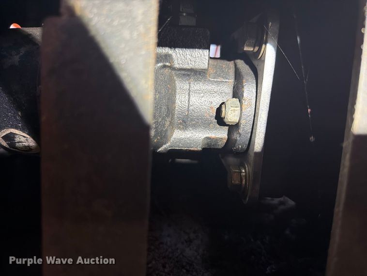 image for item EX4624 RUT Manufacturing tree shredder backhoe attachment
