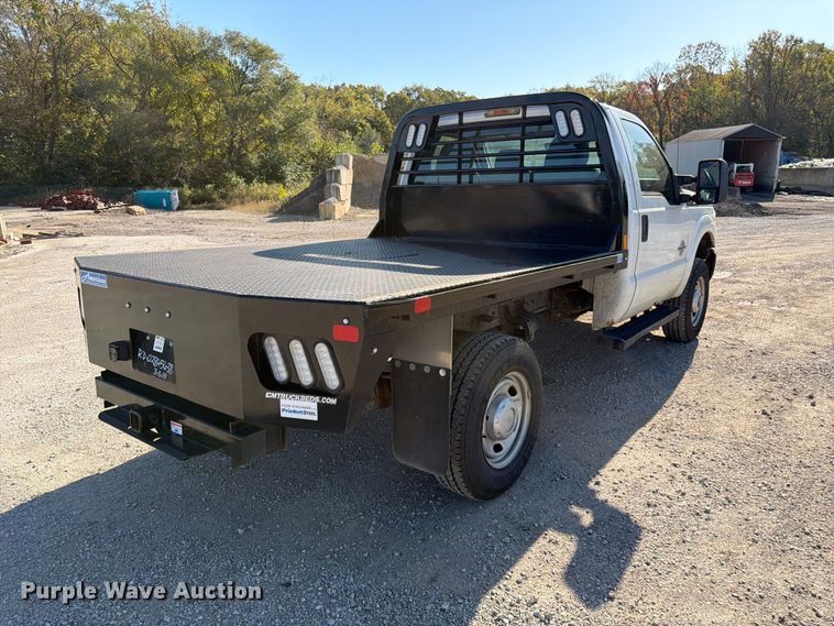 image for item FK3841 2011 Ford F350 Super Duty flatbed pickup truck