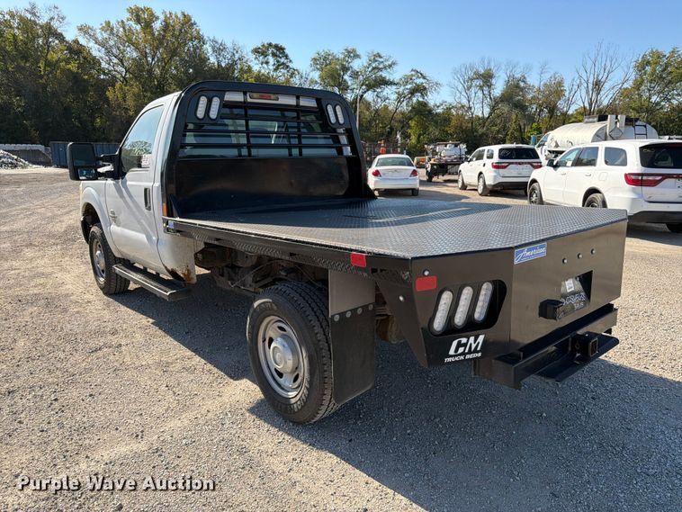 image for item FK3841 2011 Ford F350 Super Duty flatbed pickup truck