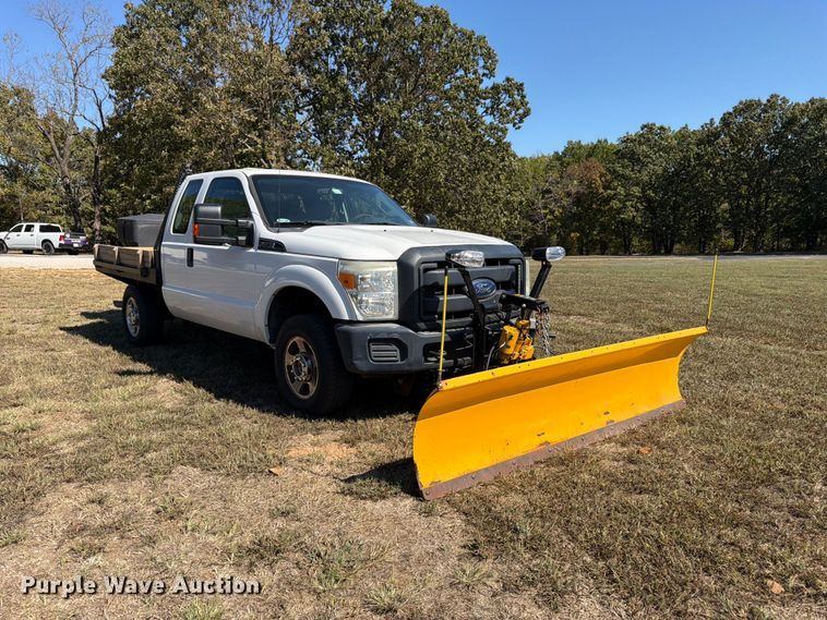 image for item DT3042 2015 Ford F250 Super Duty Ext. Cab dump flatbed pickup truck