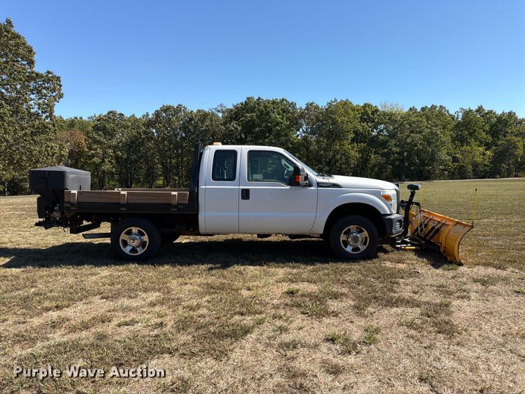 image for item DT3042 2015 Ford F250 Super Duty Ext. Cab dump flatbed pickup truck