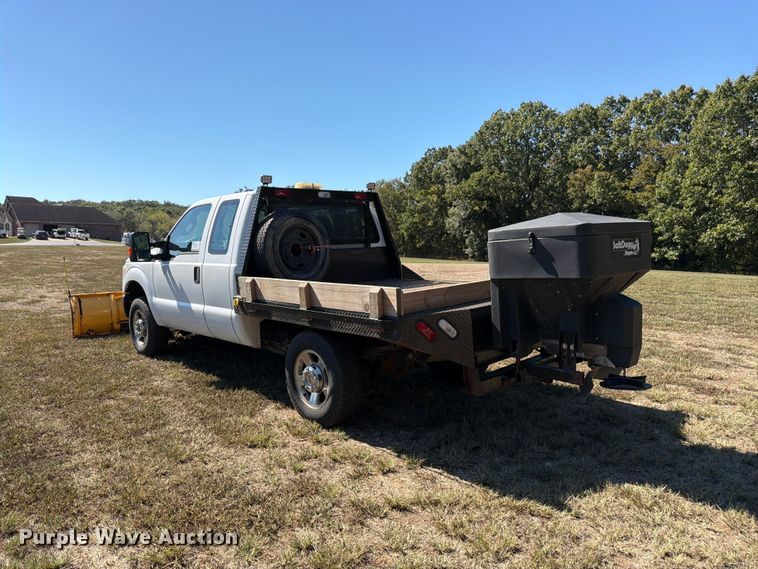 image for item DT3042 2015 Ford F250 Super Duty Ext. Cab dump flatbed pickup truck