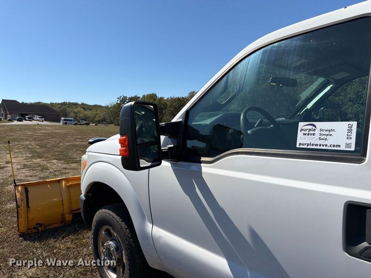 image for item DT3042 2015 Ford F250 Super Duty Ext. Cab dump flatbed pickup truck