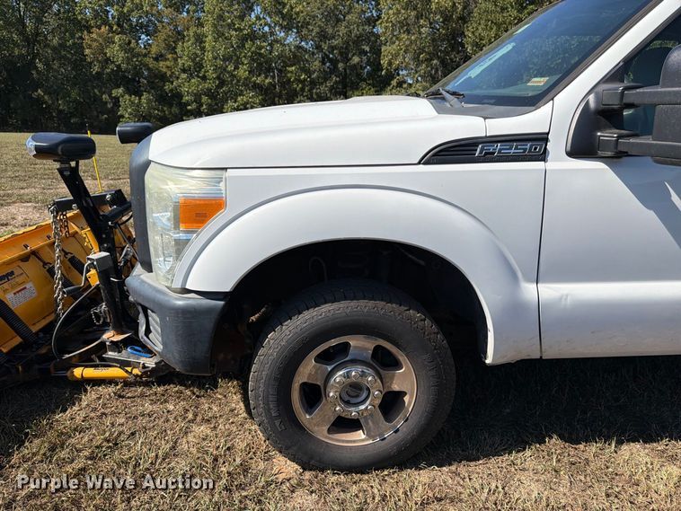 image for item DT3042 2015 Ford F250 Super Duty Ext. Cab dump flatbed pickup truck