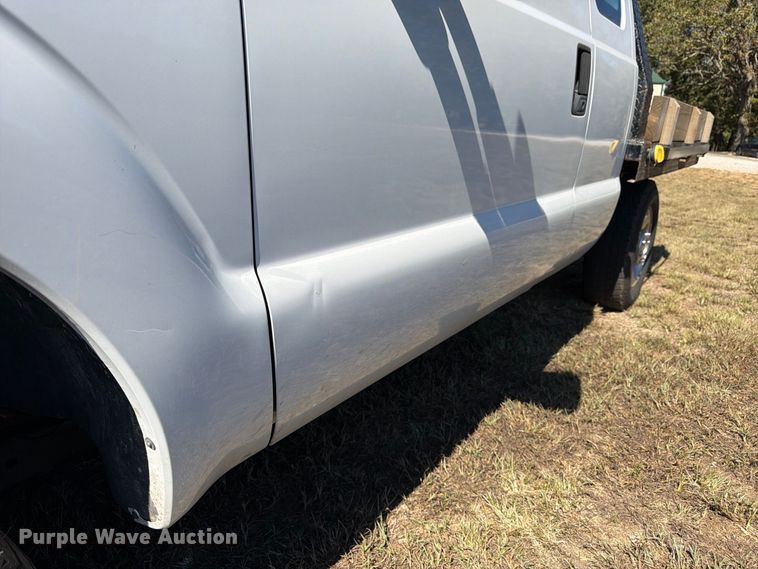 image for item DT3042 2015 Ford F250 Super Duty Ext. Cab dump flatbed pickup truck
