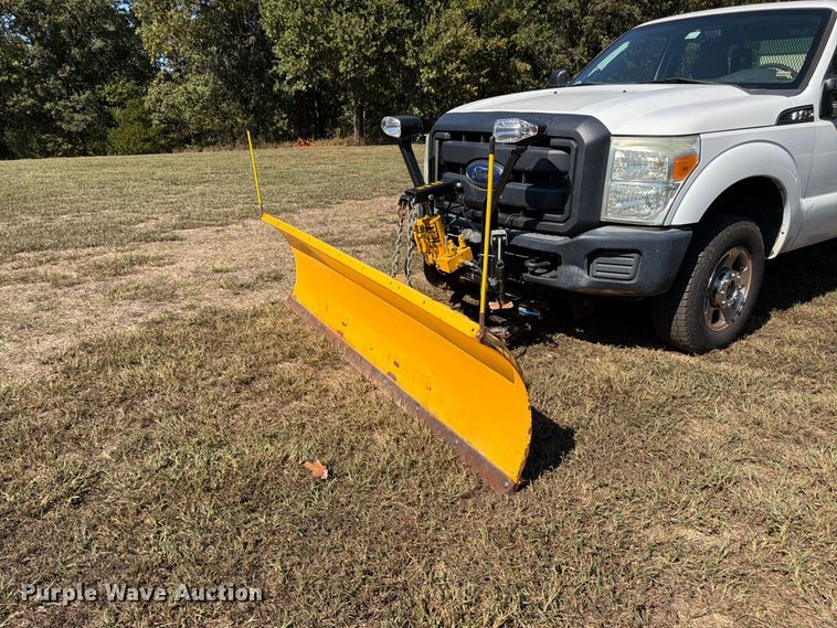 image for item DT3042 2015 Ford F250 Super Duty Ext. Cab dump flatbed pickup truck