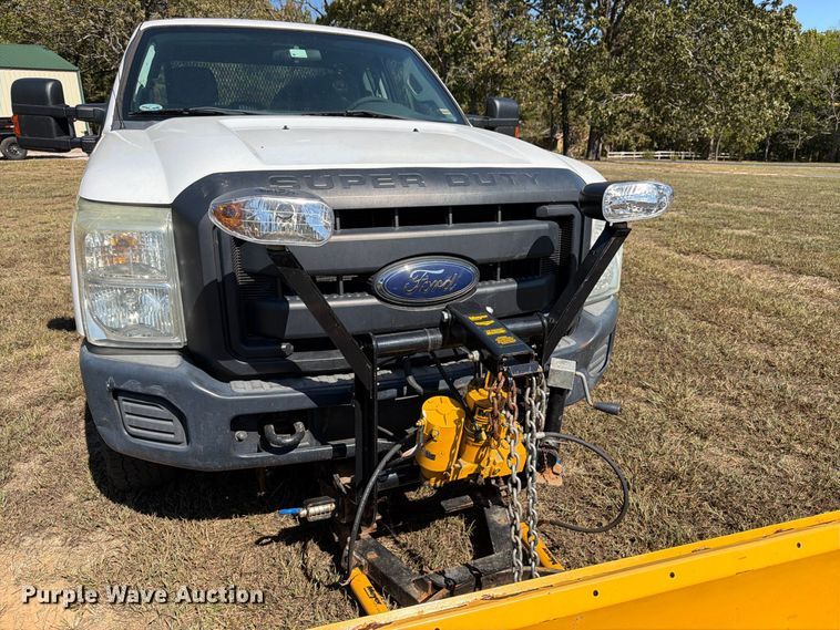 image for item DT3042 2015 Ford F250 Super Duty Ext. Cab dump flatbed pickup truck