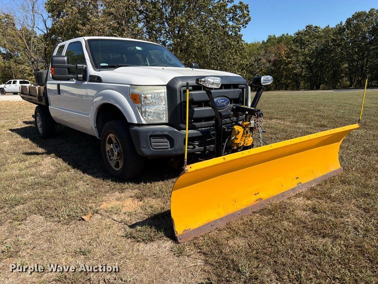 image for item DT3042 2015 Ford F250 Super Duty Ext. Cab dump flatbed pickup truck