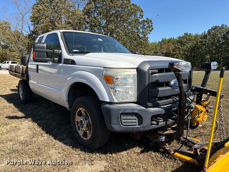 image for item DT3042 2015 Ford F250 Super Duty Ext. Cab dump flatbed pickup truck